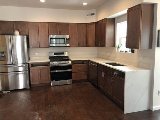 Kitchen with waterfall quartz Olympia