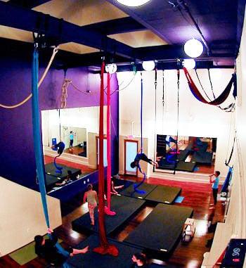 View from the warm-up area in Studio A. This studio has 20′ high ceilings (19′ from each rigging point to the mats).