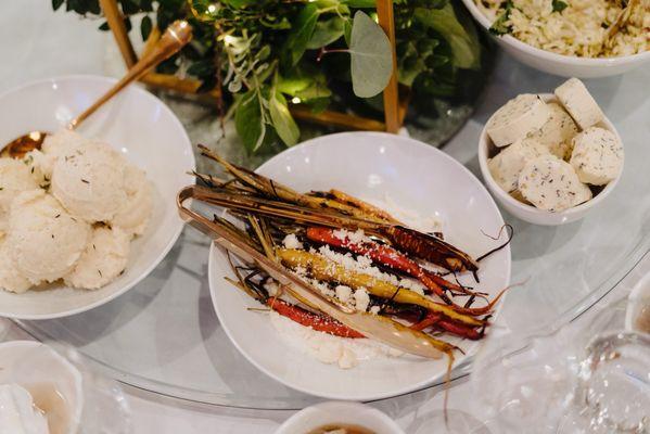 Roasted carrots with rice in background