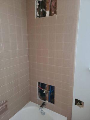 Tile cut out to install me Pex pipe in shower with no rear access