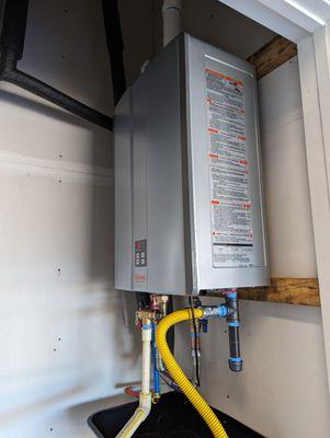 Rennai tankless water heater installed indoors