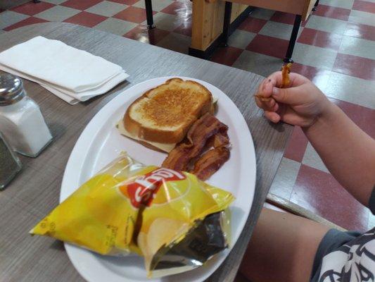 Grilled cheese with bacon on the side