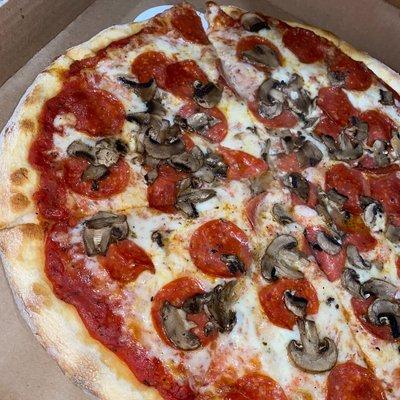 Pizza With Pepperoni and Mushrooms