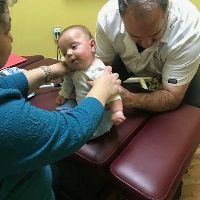 Check out this Little Cutie getting his infant adjustment! Looks like he's loving it!