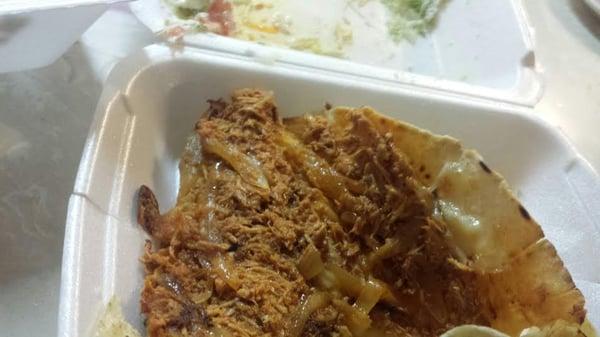 This is the quesadilla they sold me (smh)... Doesn't look like a quesadilla and it tastes just like it looks...YUCK!