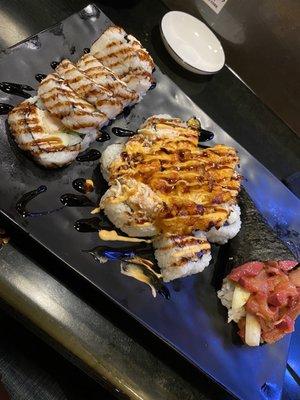 Left to right. Dynamite roll. Baked crawfish roll. Spicy hamachi roll. 10/10!!!