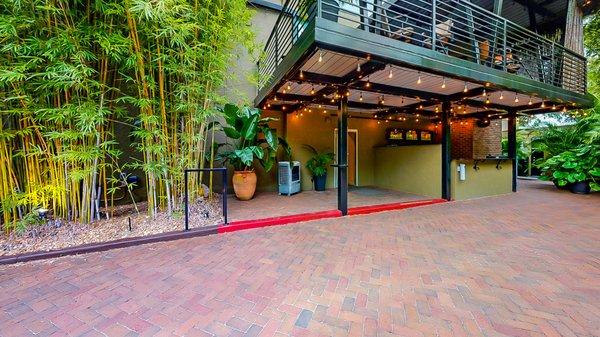 Views up onto the Private Balcony and bar from the bamboo courtyard at NOVA 535 in beautiful downtown St. Petersburg, Florida