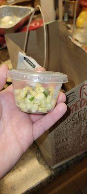 Tiny portion, the cup they serve it in is half full. Come on, really? This is your portion of corn salsa?