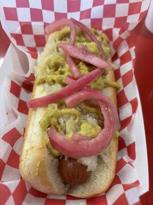 New York hot dog Brown mustard, sauerkraut, and pickled onions