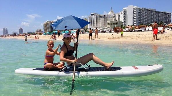 We offer Stand-Up Paddle Boards and Sit-on-top kayaks which differ by the type of paddle. The sitting style is for ocean paddling.