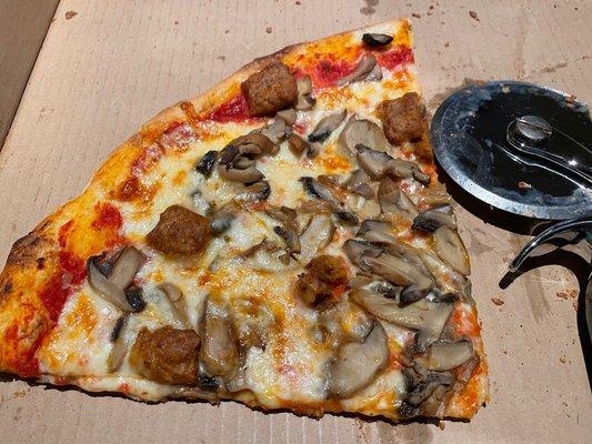 Yummy mushroom and sausage pizza