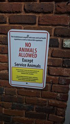 Service animals vs. emotional support animal statement. On front entry.