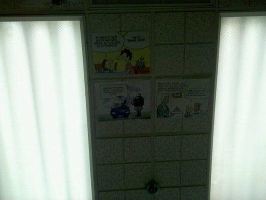 They have the funny pages on the ceiling...nice touch...lol