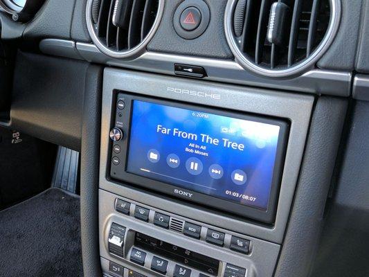 Clean install: Sony XAV-AX100 in a 2006 Porsche Cayman S.