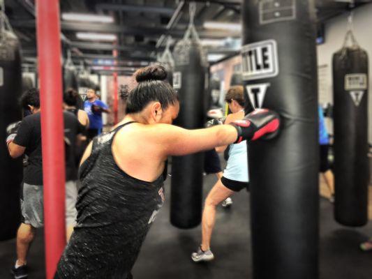 Punching the 100lb heavy bag!