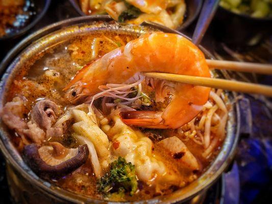 Massive shrimp in the spicy broth with my addition of garlic, ginger, soy sauce, salt and pepper = DA BOMB!!!