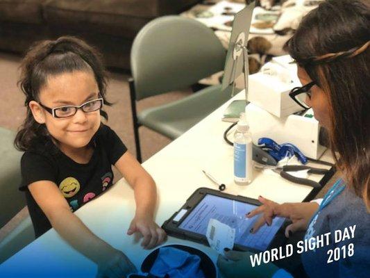 Marciea Williams from Oakbrook Terrace at a OneSight clinic on October 10 in Omaha, Nebraska providing eye exams and eyewear to children.