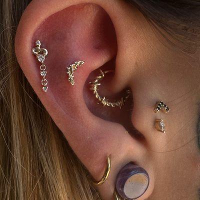 Fresh helix and snonch piercings by Athena