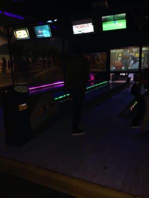 Glow in the dark bowling. Should have used a flash