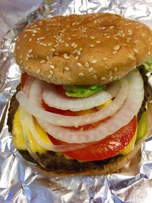 Great balance of fresh tomato, onion, lettuce, burger and catsup/mustard.