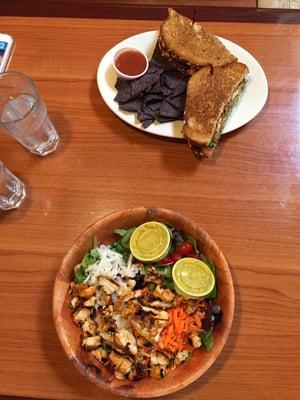 Salad and sandwich with chips and salsa