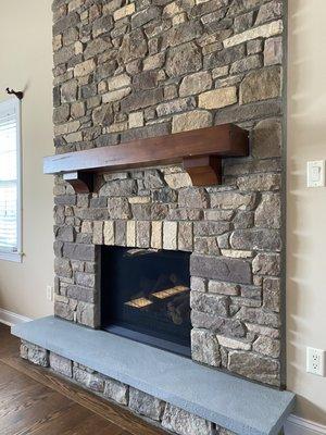 Regency B36XTCE Direct Vent Gas Fireplace accented by custom stone work.