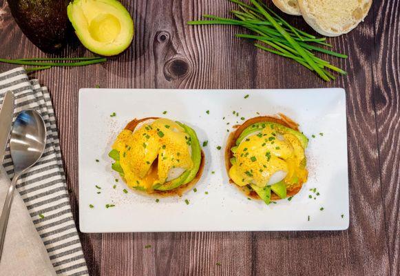 Plate-based Eggs Benedict with housemade hollandaise sauce at Brunch