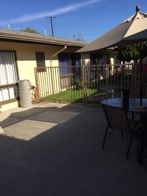 Back patio with an easy wheel chair accessible automatic door