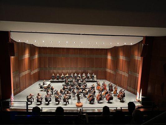 Enjoying the Richardson Symphony Orchestra from the mezzanine level. Great seats!