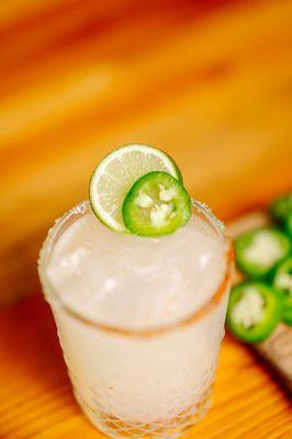 Spicy Margarita The classic with a perfect jalapeño twist. Jalapeño infused Espolon, sweetened with agave, served with a tajin rim.