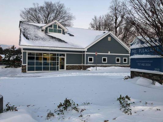 A snowy vet clinic view.