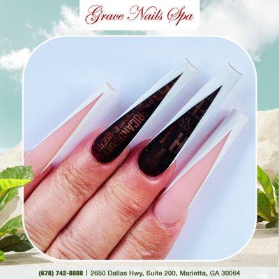 Own the room with long coffin V-shape French nails that demand attention!