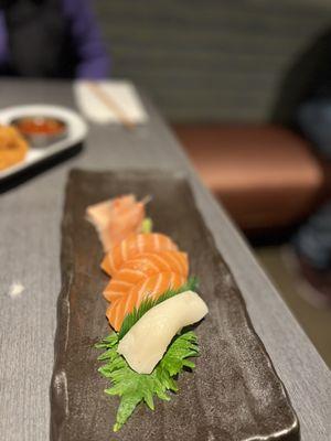 3 pc salmon nigiri and 1 pc white tuna nigiri