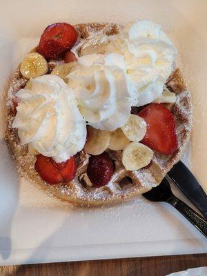 Belgium waffle with strawberries and Bananas and amazing whipped cream