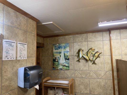 Clean restrooms with baby changing table