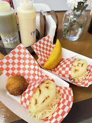 Arepas, yuca balls, empanada