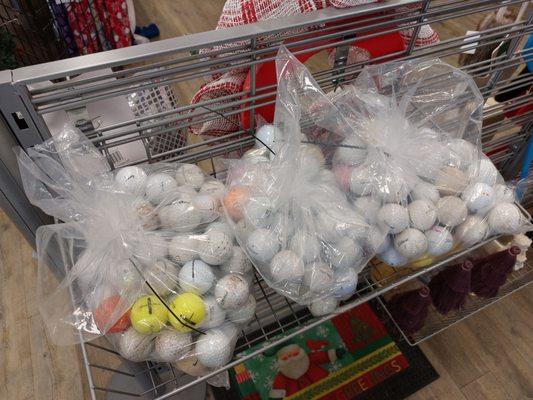 Lots of golf balls needing a good home