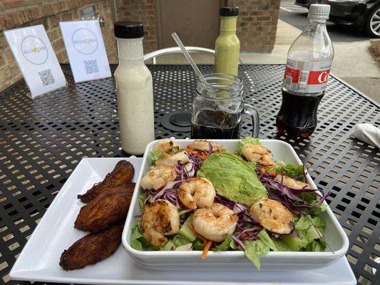 Shrimp salad with plantains on the side.