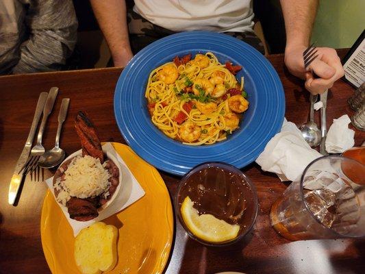 Red bean and rice with sausage and cajun shrimp pasta.