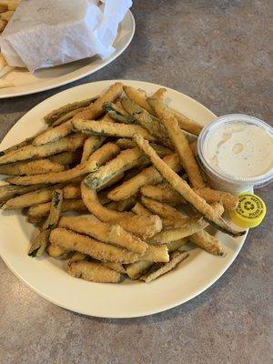 Fried zucchini. The cap for reference on the big cup of ranch.