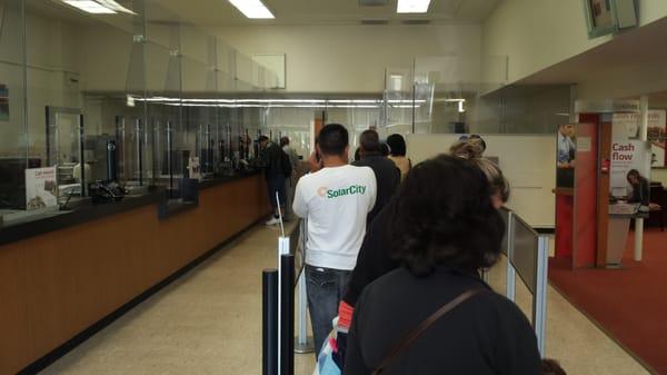 Line out the door. 1 teller open.