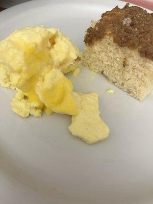 Breakfast  A piece of cake with undercooked egg