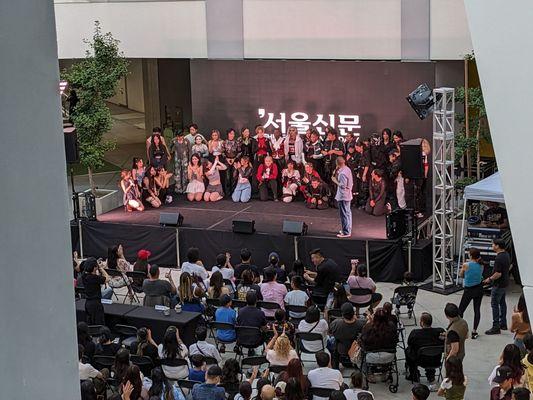 KPOP Cover Dance Festival performers on stage awaiting to see who won