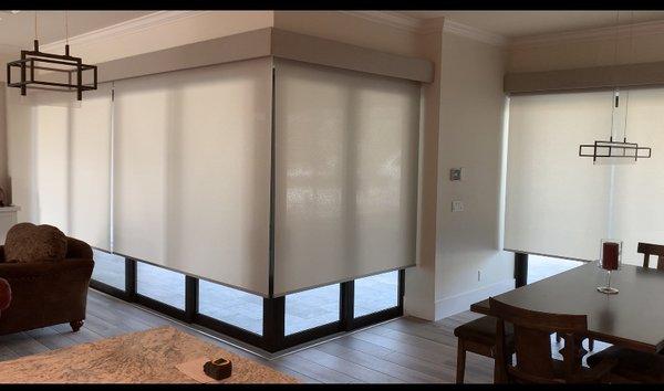 Motorized roller shades