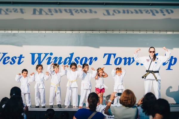 Our Tigers on stage at National Night Out demonstrating their oath