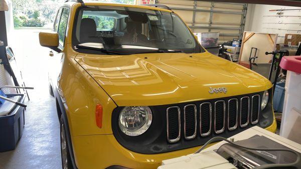 Bright yellow jeep, hit in the rear at a red light