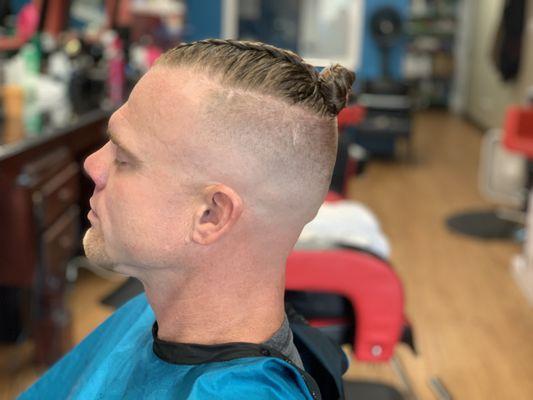 Braids and haircut (high fade) with blade