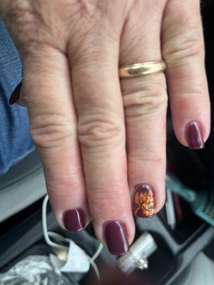 Another great manicure and design for fall. Love the leaf and he added sparkle to it too