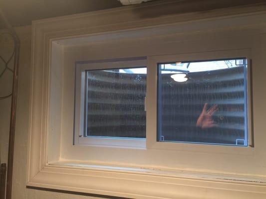 We recommended this hopper window as an alternative to the traditional glass block for a Basement office.