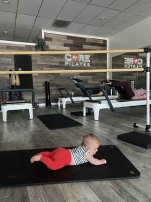 Barre/reformer combo class with our assistant teacher Moriah on the ground making sure everyone is doing the right moves